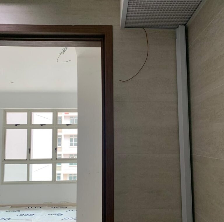 Wiring point above a doorway ready for light switch installation in a Singapore home