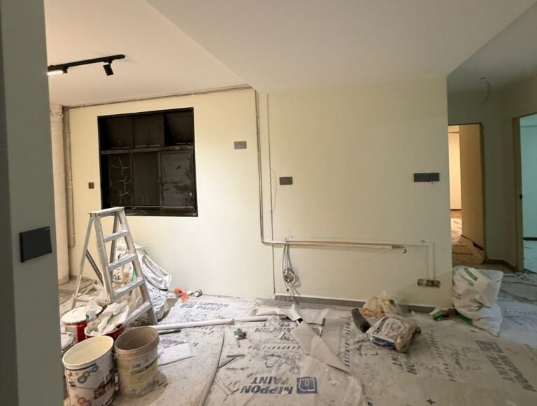 Track lighting installed in a living room during renovation electrical works in Singapore