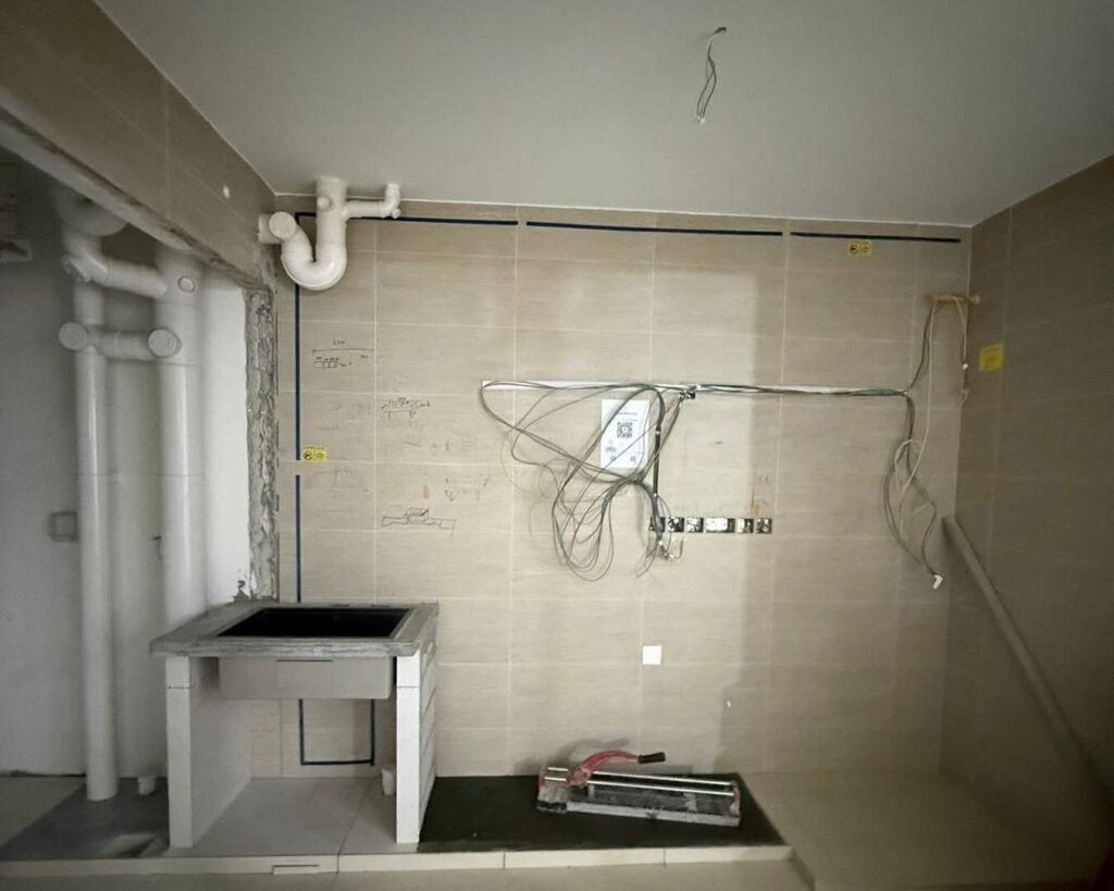 Kitchen wall wiring points for appliances and power points during renovation in Singapore