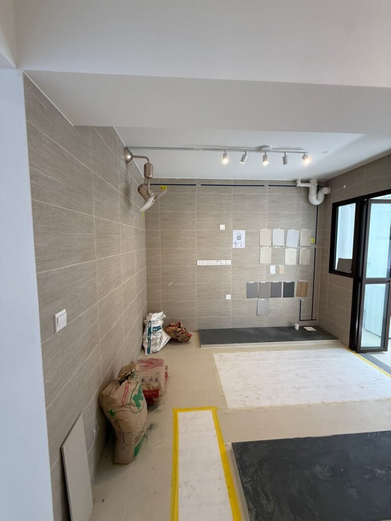 Kitchen with track lighting and wall wiring points during renovation in a Singapore HDB flat