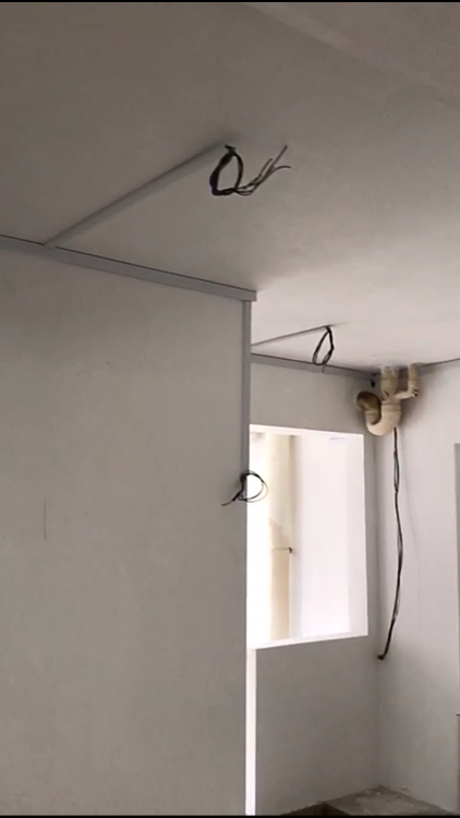 Wiring point at a ceiling beam ready for light fixture installation in Singapore