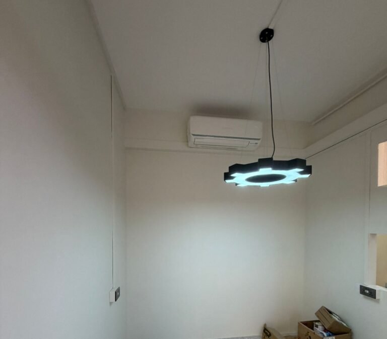 Decorative LED ceiling light and air conditioner installed in a Singapore home
