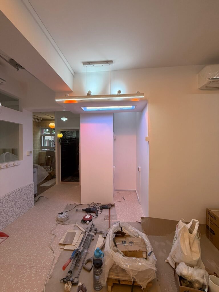 LED strip lighting installed on a false ceiling pelmet in a renovated Singapore home
