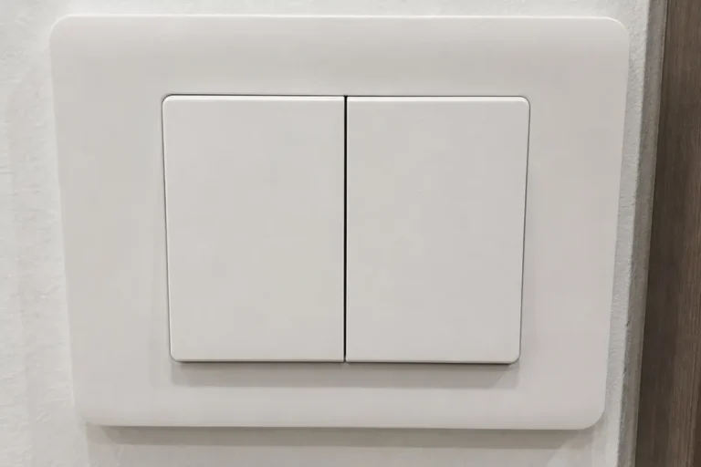 2-gang light switch fitted during a light switch replacement in a Singapore home